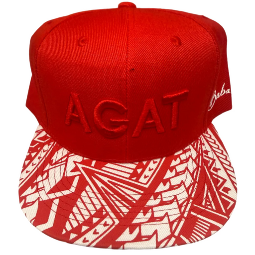 A red flat-brim snapback cap with 'AGAT' embroidered on the front and a red-and-white geometric pattern on the brim, displayed on a gray tabletop.