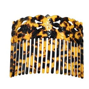 Tortoiseshell comb on a white background