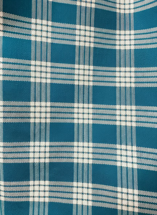 Close-up of blue and white plaid fabric pattern