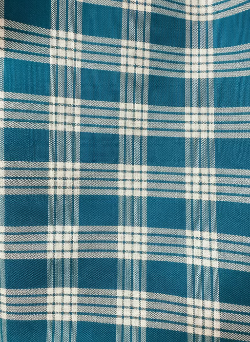 Close-up of blue and white plaid fabric pattern