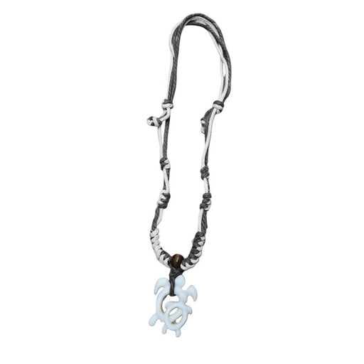 Necklace with a turtle pendant on a white background