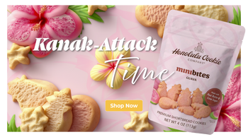 Packaging of Honolulu Cookie Company mini bites with cookies and flowers on a pink background
